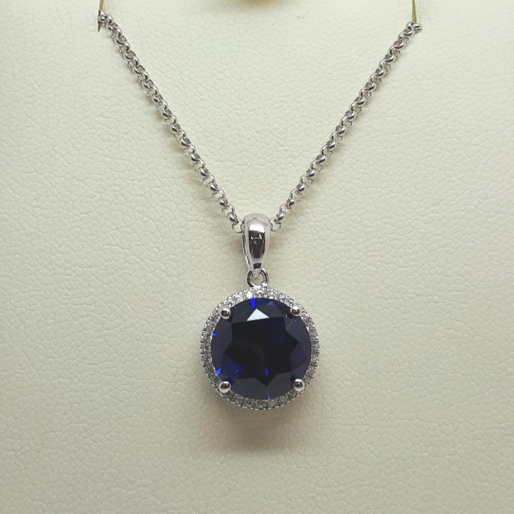 Sterling silver round sapphire pendant